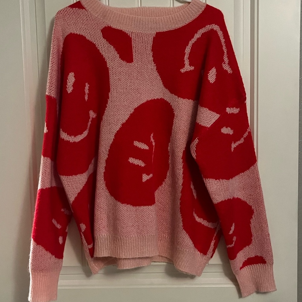 Pink smiley faces over sized alter’d state sweater